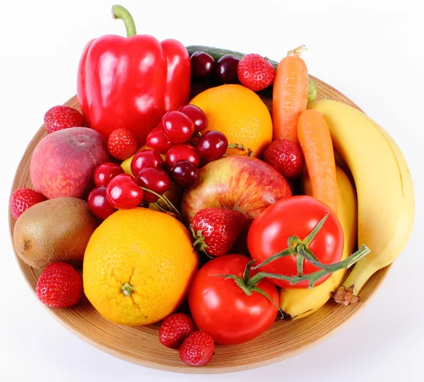 Fresh fruits and vegetables on wooden plate — Stock Photo, Image