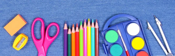 School and office supplies on jeans background, back to school concept — Stock Photo, Image