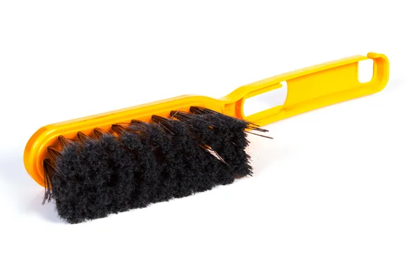 New orange broom for cleaning on white background — Stock Photo, Image