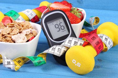 Şeker şeker seviyesi, sağlıklı gıda, halter ve santimetre, diyabet, sağlıklı ve sportif yaşam tarzı ile ölçüm