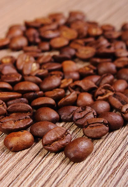 Pico de café no fundo de madeira — Fotografia de Stock