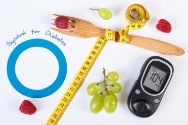 Glucometer, dünya diyabet günü sembolü, santimetre ile taze meyve