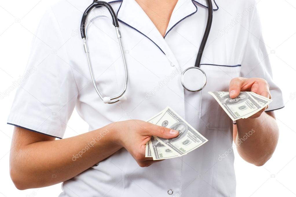 Woman doctor with stethoscope and currencies dollar, corruption, bribe or paying for care concept