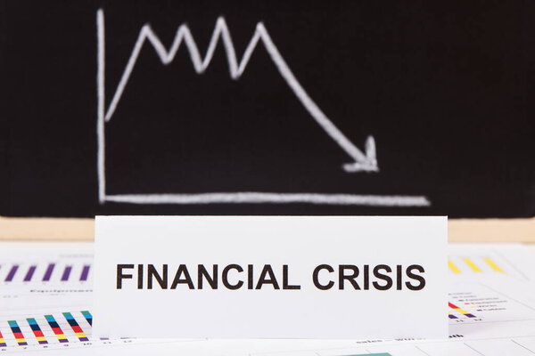 Inscription financial crisis and declining chart. Risk of global financial crash caused by coronavirus. Covid-19