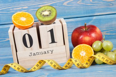 1 Ocak küp takvimi, taze meyve ve mezura, sağlıklı yaşam tarzının yeni yıl çözümleri