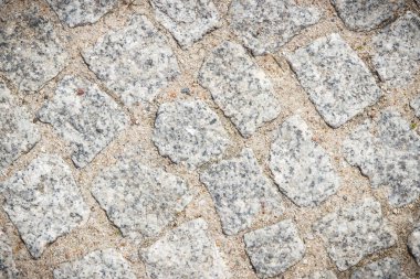 Yaya ya da kaldırım taştan ya da kayadan yapılmış. Arkaplan dokusu