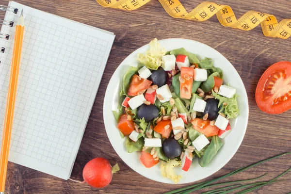 Fresh Prepared Greek Salad Feta Cheese Notepad Tape Measure Slimming — Stock Photo, Image