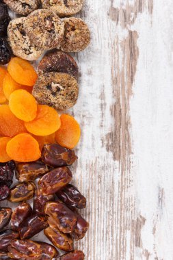 Food containing vitamins and dietary fiber, natural sources of minerals, concept of healthy lifestyle and nutrition, copy space for text on rustic board