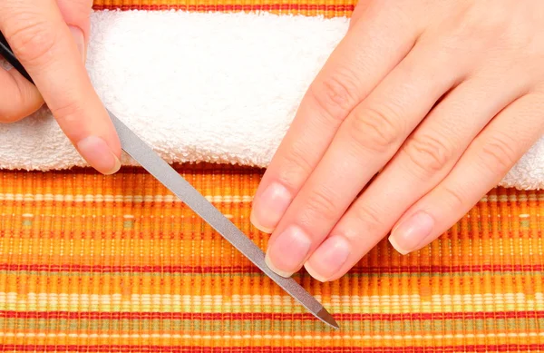 Woman polishing nails, manicure — Stock Photo, Image