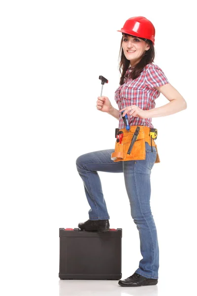 Builder woman standing with tools — Stock Photo, Image