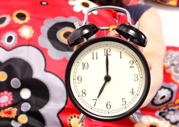Seven o'clock indicated on the alarm clock — Stock Photo, Image