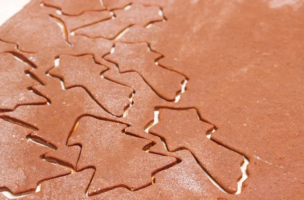 Dough for cookies in shape of christmas tree and star — Stock Photo, Image