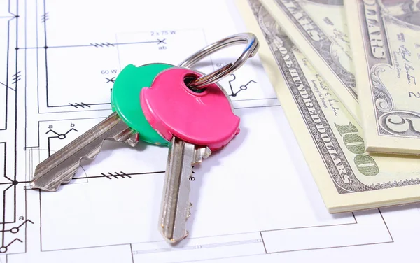 Banknotes and keys on construction drawing of house — Stock Photo, Image