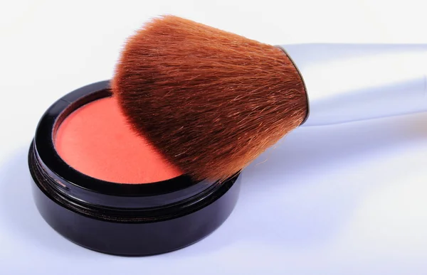 Brush and cosmetics for makeup — Stock Photo, Image