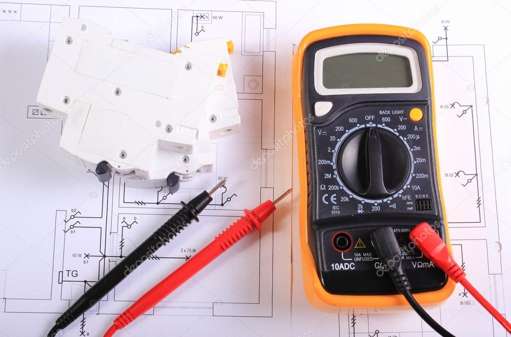 Multimeter and electric fuse on construction drawing