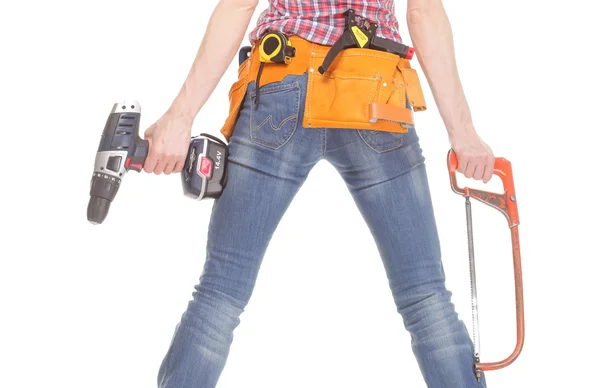 Woman holding saw and drill. White background — Stock Photo, Image