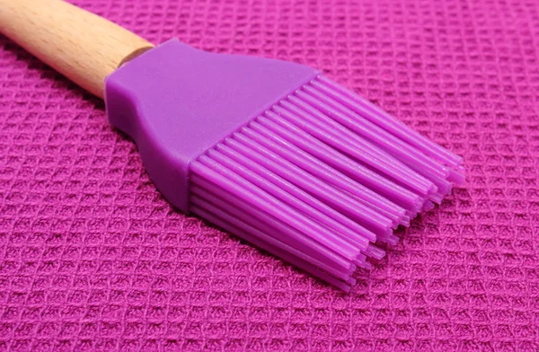 Closeup of purple silicone kitchen accessories — Stock Photo, Image