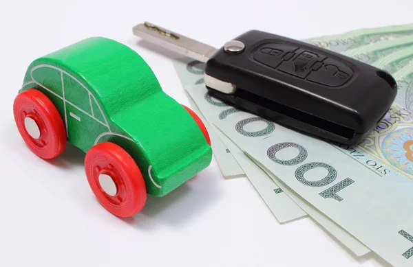 Money, green toy car and key vehicle. White background — Stock Photo, Image