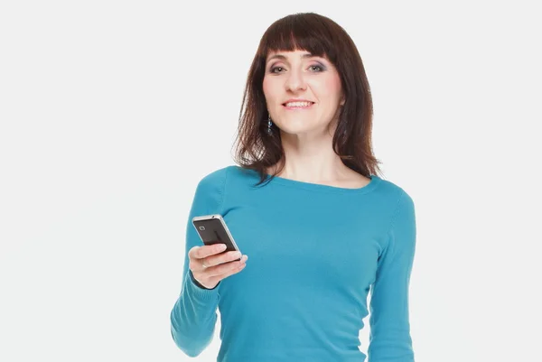 Woman with mobile phone on white background — Stock Photo, Image