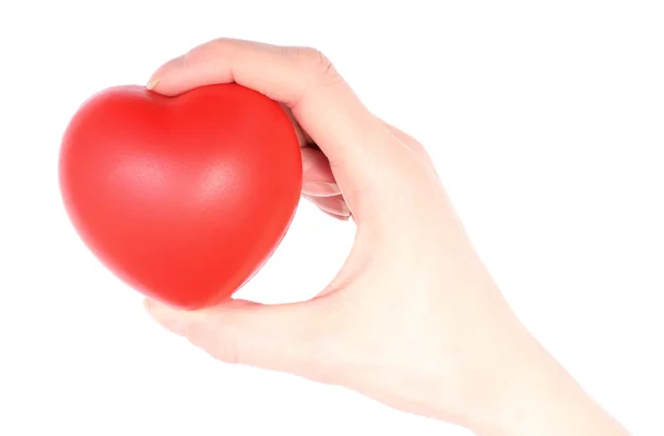 Mano de mujer sosteniendo el corazón rojo. Fondo blanco — Foto de Stock