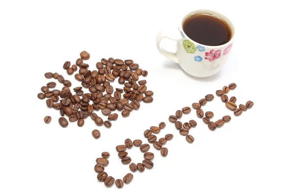 Nápis kávu a šálek nápoje na bílém pozadí — Stock fotografie