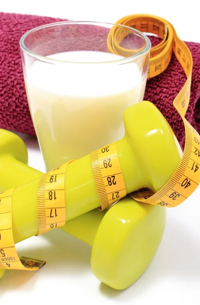Accessories for using in fitness and measure tape with glass of milk — Stock Photo, Image