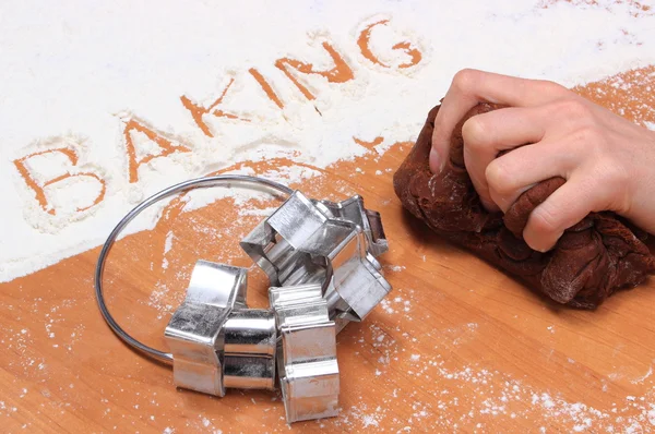 Kneading dough for Christmas cookies and accessories — Stock Photo, Image