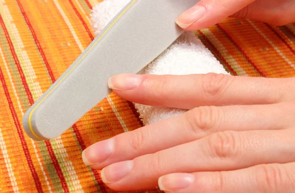 Woman polishing nails, manicure — Stock Photo, Image