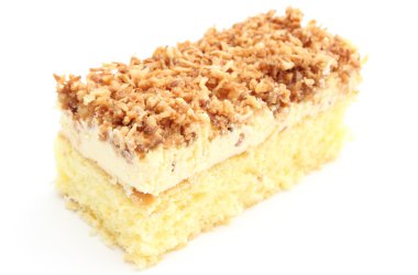 sünger kek krem ve Hindistan cevizi. Beyaz arka plan