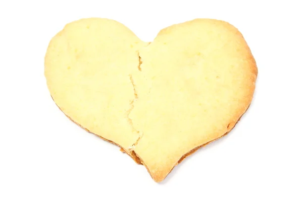 Valentine broken heart of yeast cake on white background — Stock Photo, Image