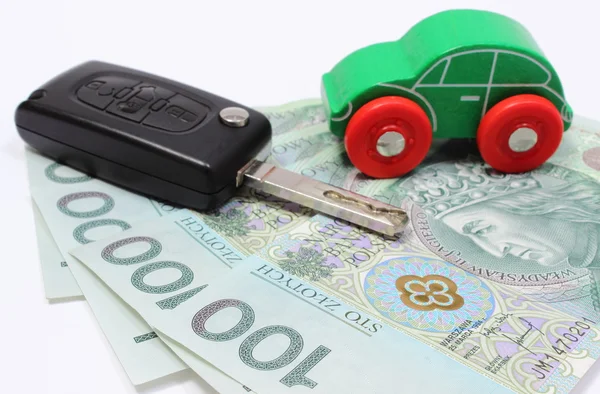 Money, green toy car and key vehicle. White background — Stock Photo, Image