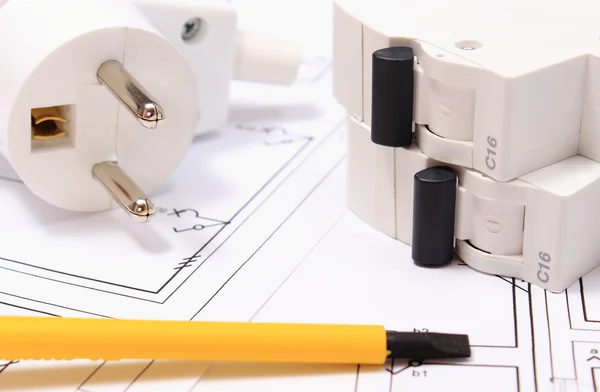 Screwdriver, electric plug and fuse on construction drawing — Stock Photo, Image