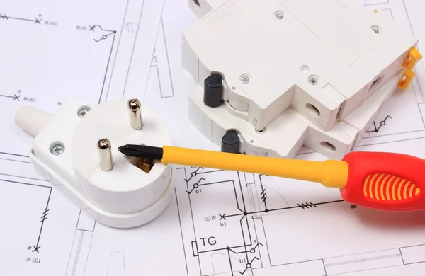 Screwdriver, electric plug and fuse on construction drawing — Stock Photo, Image