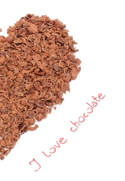 Half of heart from grated chocolate on white background — Stock Photo, Image