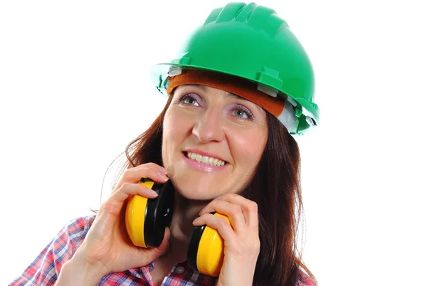 Donna con casco protettivo e cuffie — Foto Stock