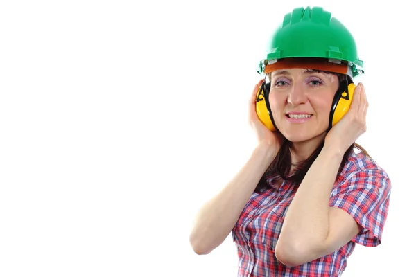 Woman wearing protective helmet and headphones — Stock Photo, Image