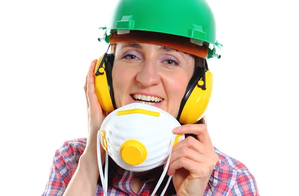 Žena s ochrannou maskou nosit přilbu a sluchátka — Stock fotografie