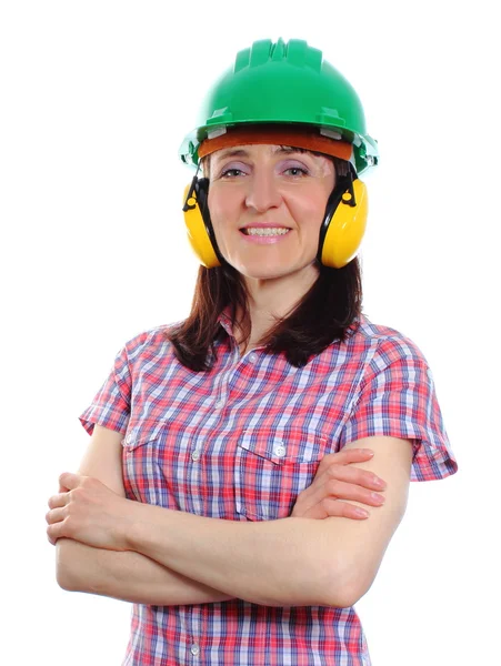 Mulher usando capacete protetor e fones de ouvido — Fotografia de Stock