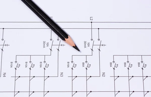 Pencil lying on electrical diagrams — Stock fotografie