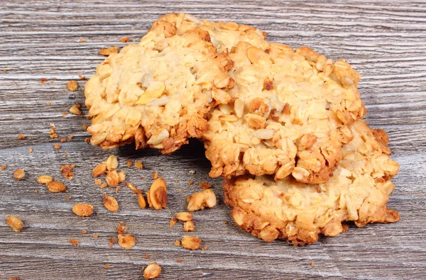 Oatmeal cookies on wooden background — Stock Photo, Image