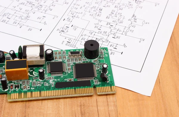 Printed circuit board and diagram of electronics, technology — Stock fotografie