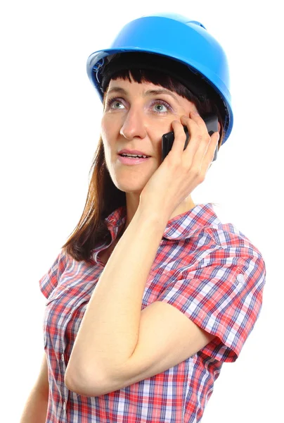 Builder woman in protective helmet talking on mobile phone — Stock Photo, Image
