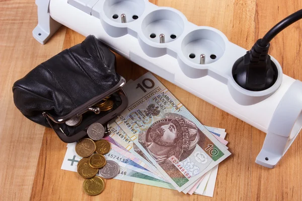 Electrical power strip with connected plug and polish currency money, energy costs — Stock Photo, Image