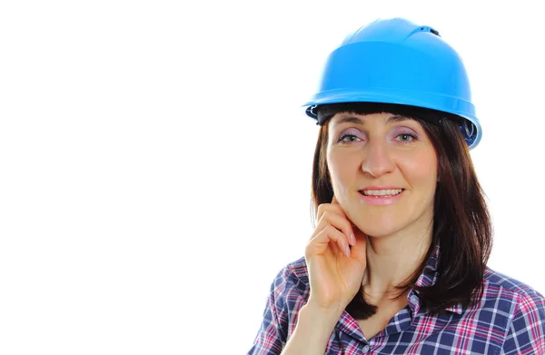 Sorrindo mulher construtor vestindo protetor capacete azul — Fotografia de Stock