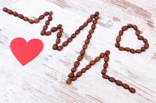 Cardiogramme ligne de grains de café torréfiés et coeur rouge, médecine et concept de soins de santé — Photo