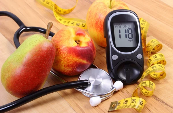 Glucose meter with medical stethoscope and fresh fruits, healthy lifestyle — 스톡 사진