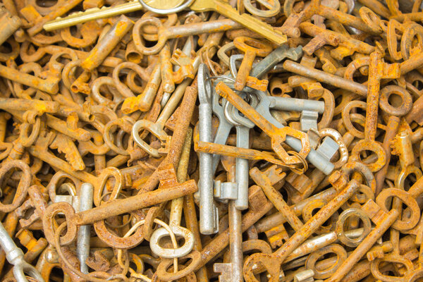 Heap of old rusty keys for sale at the bazaar as background