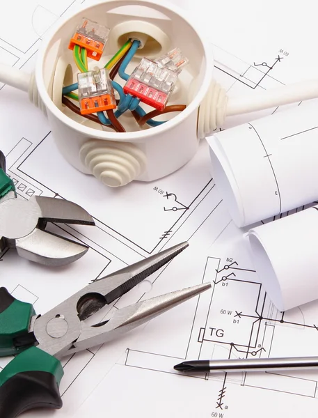 Work tools, electrical box with cables and electrical construction drawing — Stock Photo, Image