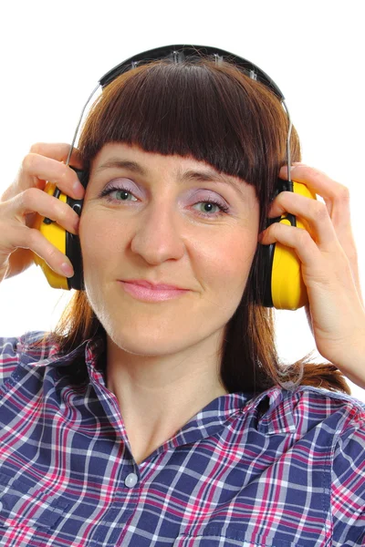 Tvůrce žena nosí ochranné sluchátka — Stock fotografie