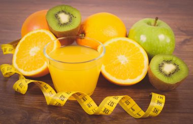Vintage photo, Fresh fruits, juice and tape measure, healthy lifestyles and nutrition